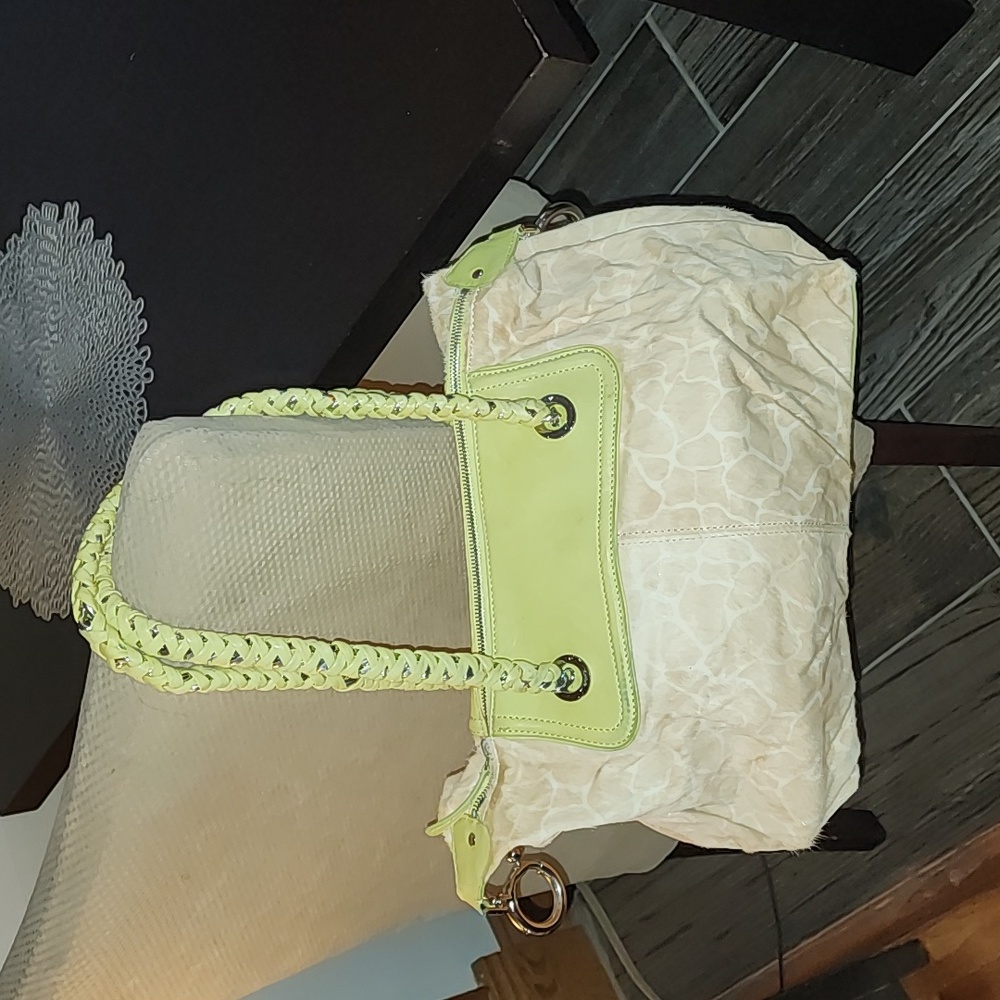 Genuine goat hair green leather trim shoulder bag with long chain straps.